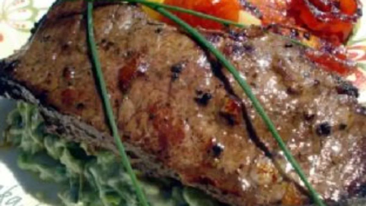 Strip steak with roasted cherry tomatoes and vegetable mash